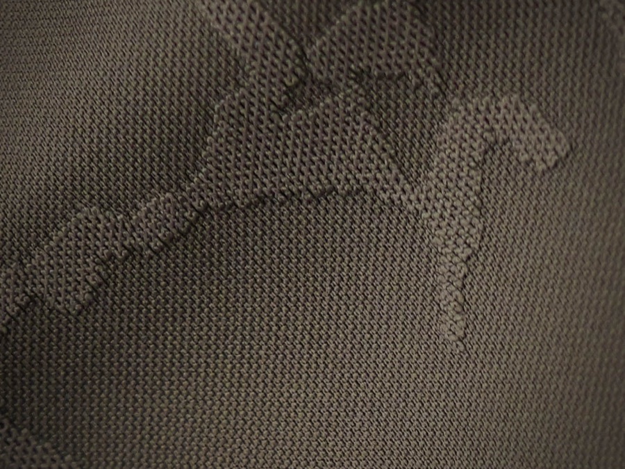 Close-up of recycled camo-jacquard knit fabric